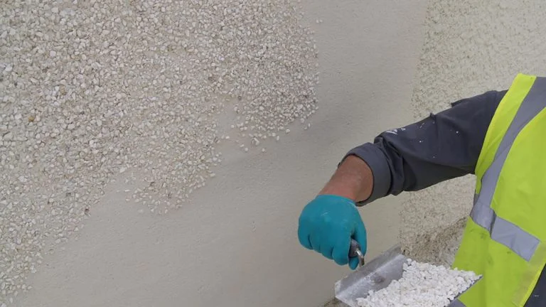 Smooth and textured render finishes in Cobham Surrey