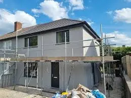 Rendering In Oxshott — exterior rendering project completed in Oxshott Surrey