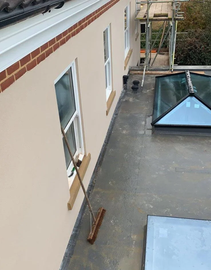 Rendering In Hersham — upper wall rendering work on a Surrey property near Hersham