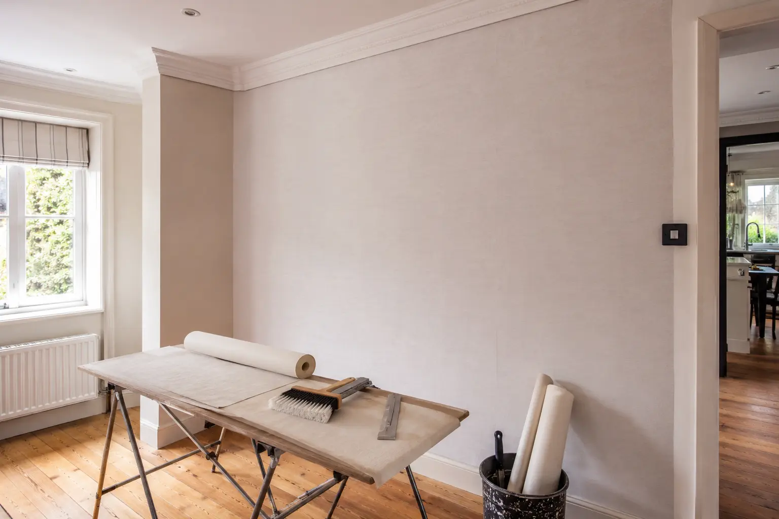 Lining paper applied to an interior wall before painting for a smooth finish